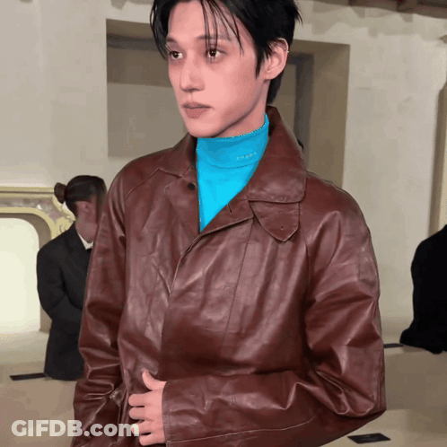 Man In Brown Leather Jacket And Blue Prada Shirt GIF