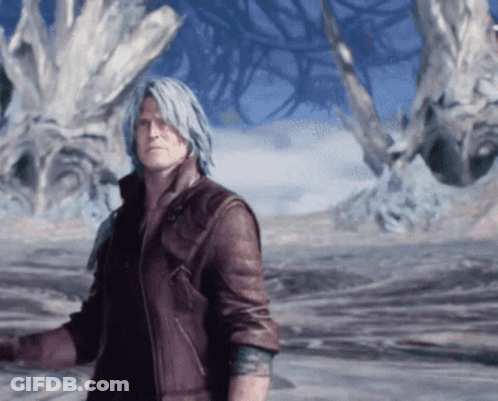 Man In Brown Leather Jacket Standing Before Large Tree GIF