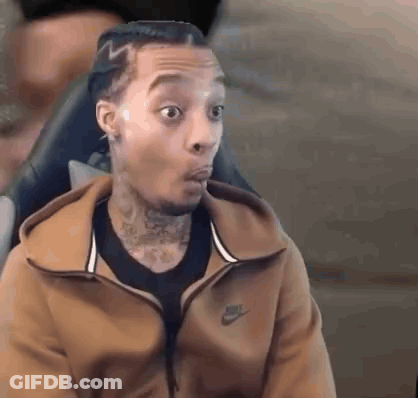 Man In Brown Nike Jacket Sitting Mouth Open GIF