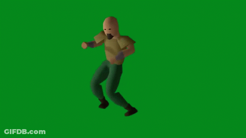 Man In Brown Shirt And Green Pants Standing On Green Screen GIF