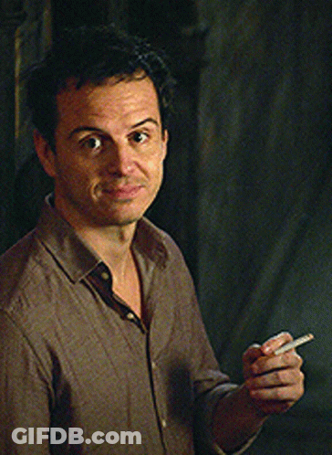 Man In Brown Shirt Holding Cigarette GIF