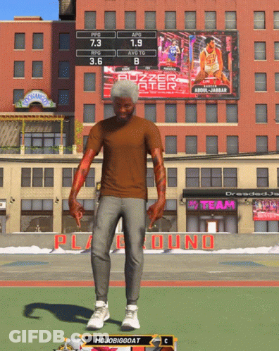 Man In Brown Shirt In Front Of Buzzer Beater Sign GIF