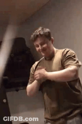 Man In Brown Shirt Smiling GIF