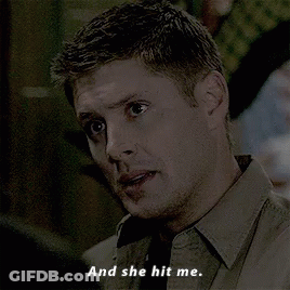 Man In Brown Shirt Talking On Cell Phone She Hit Me GIF