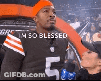 Man In Browns Jersey Interviewed By Woman In Crowd GIF