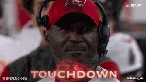 Man In Buccaneers Hat And Headphones Saying Touchdown GIF
