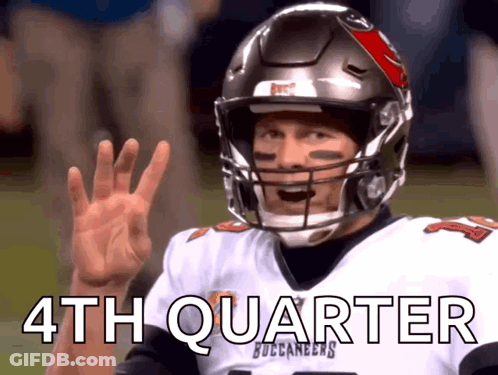 Man In Buccaneers Jersey And Helmet Waving GIF