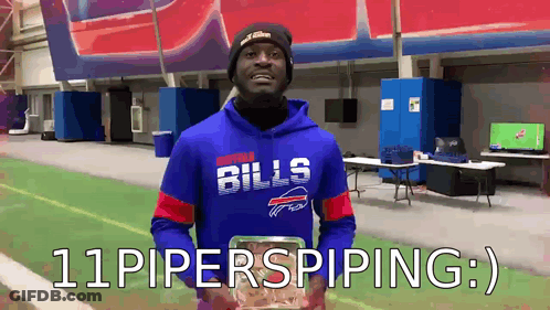 Man In Buffalo Bills Hoodie Holding Food Box GIF