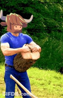 Man In Bull Mask Holding Log And Shovel GIF