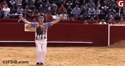 Man In Bullring Outstretched Arms Valencia Shirt GIF