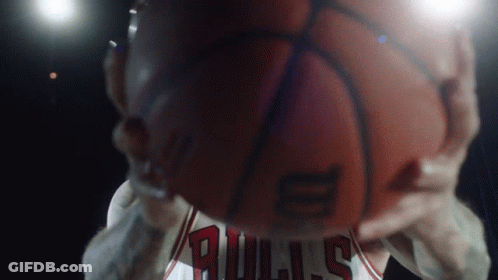 Man In Bulls Jersey Holding Basketball GIF