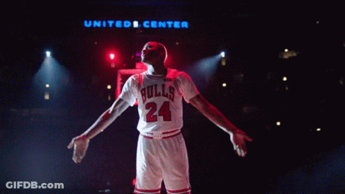 Man In Bulls Jersey In Front Of United Center GIF