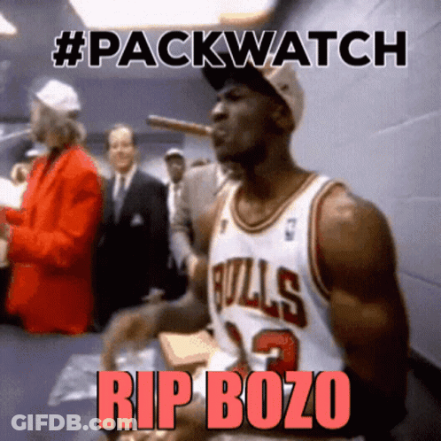 Man In Bulls Jersey Smoking Cigar #Packwatch Rip Bozo GIF
