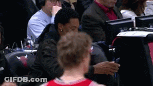 Man In Bulls Shirt Sitting In Stands GIF