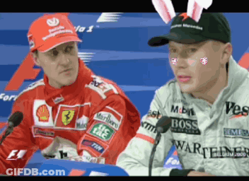 Man In Bunny Ears Sitting Next To Another Man GIF