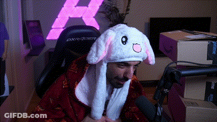 Man In Bunny Hat Sitting In Front Of Microphone GIF