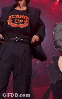Man In Burning Up T-Shirt Holding Microphone GIF
