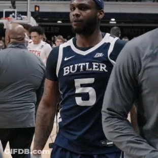 Man In Butler 5 Jersey Stands On Court GIF