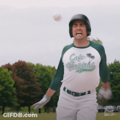 Man In Cafe Tropical Jersey Throwing Ball GIF