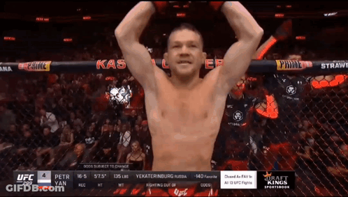 Man In Cage With Arms Up Saying Kas GIF