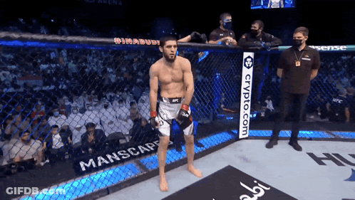 Man In Cage With Crypto.com Sign GIF