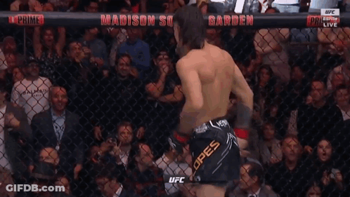 Man In Cage With Crypto Sign GIF