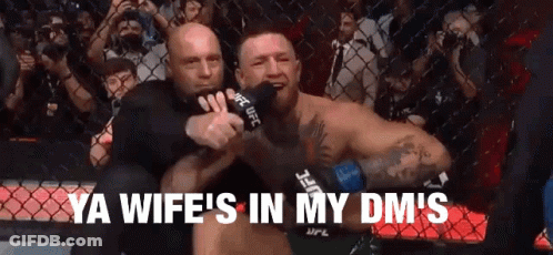 Man In Cage With Microphone And DMs GIF