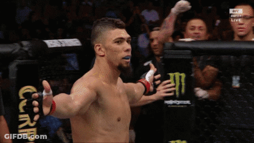 Man In Cage With Monster Energy Drink Ad GIF