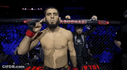 Man In Cage With Prime On Fence GIF