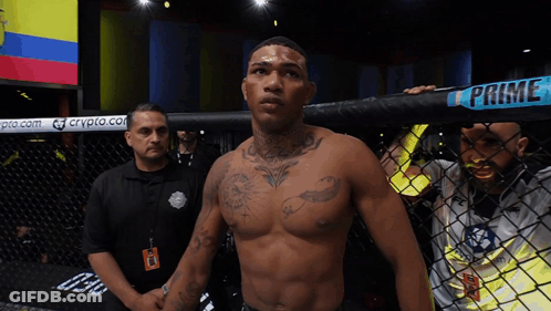 Man In Cage With Sign Saying Prime GIF