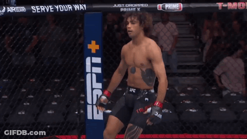 Man In Cage With Sign Saying Serve Your Way GIF