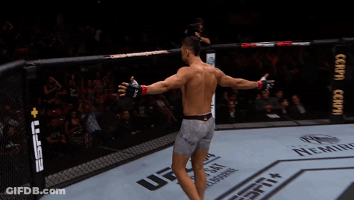Man In Cage With Smirnoff Bottle GIF