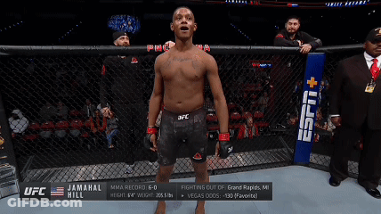 Man In Cage With UFC Sign GIF