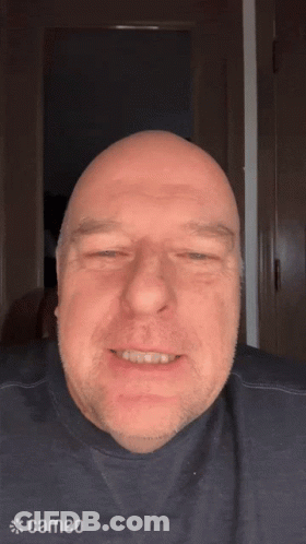 Man In Cameo Shirt Smiling GIF