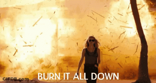 Man In Camo Jacket Holding Torch GIF