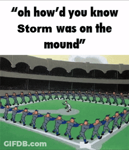 Man In Camo Jacket Watching Horses In Field GIF