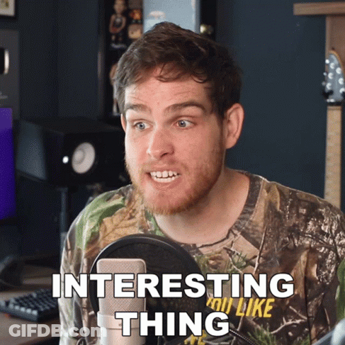 Man In Camo Shirt Talking Into Microphone Interesting Thing GIF