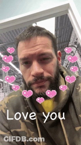 Man In Camouflage Hoodie With Pink Hearts Saying Love You GIF