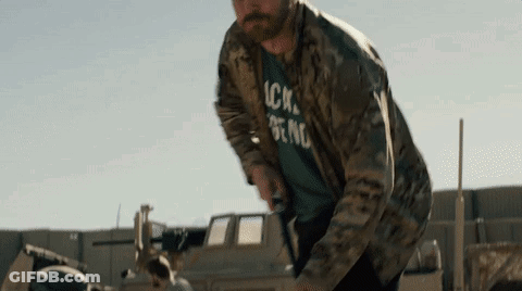 Man In Camouflage Jacket And T-Shirt By Truck GIF