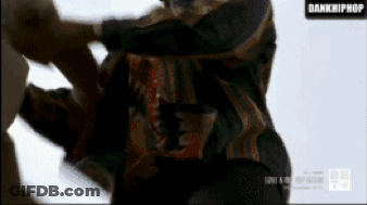 Man In Camouflage Jacket Attacked By Another Man Dankhiphop GIF