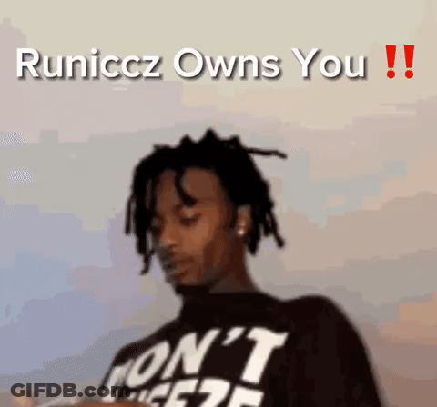 Man In Camouflage Jacket In Kitchen GIF