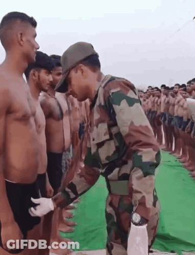 Man In Camouflage Uniform GIF