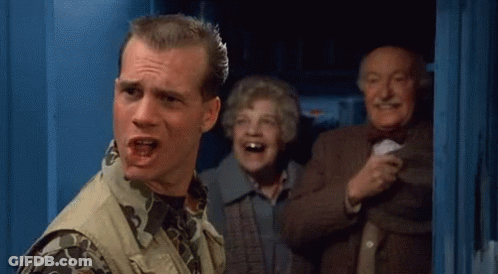 Man In Camouflage Vest And Two Older People GIF