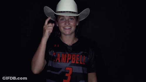 Man In Campbell Jersey Holding Cowboy Hat Over Face GIF