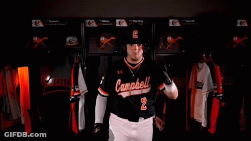 Man In Campbell Jersey Holding Up Gloves GIF