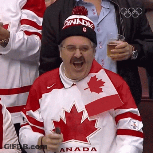 Man In Canada Jersey And Beanie Laughing GIF