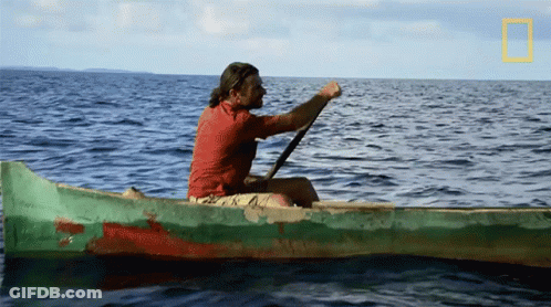Man In Canoe With National Geographic Logo GIF