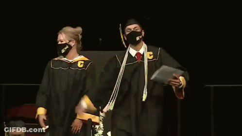 Man In Cap And Gown With C GIF