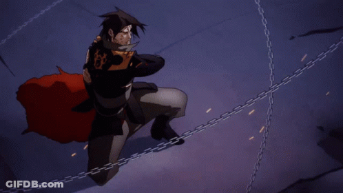 Man In Cape Chained To Wall GIF