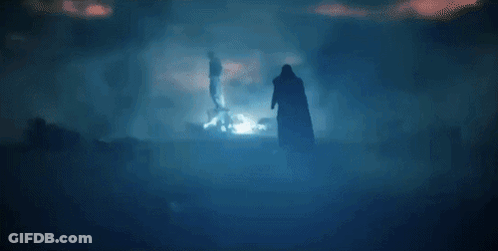Man In Cape Standing In Storm With Lightning GIF